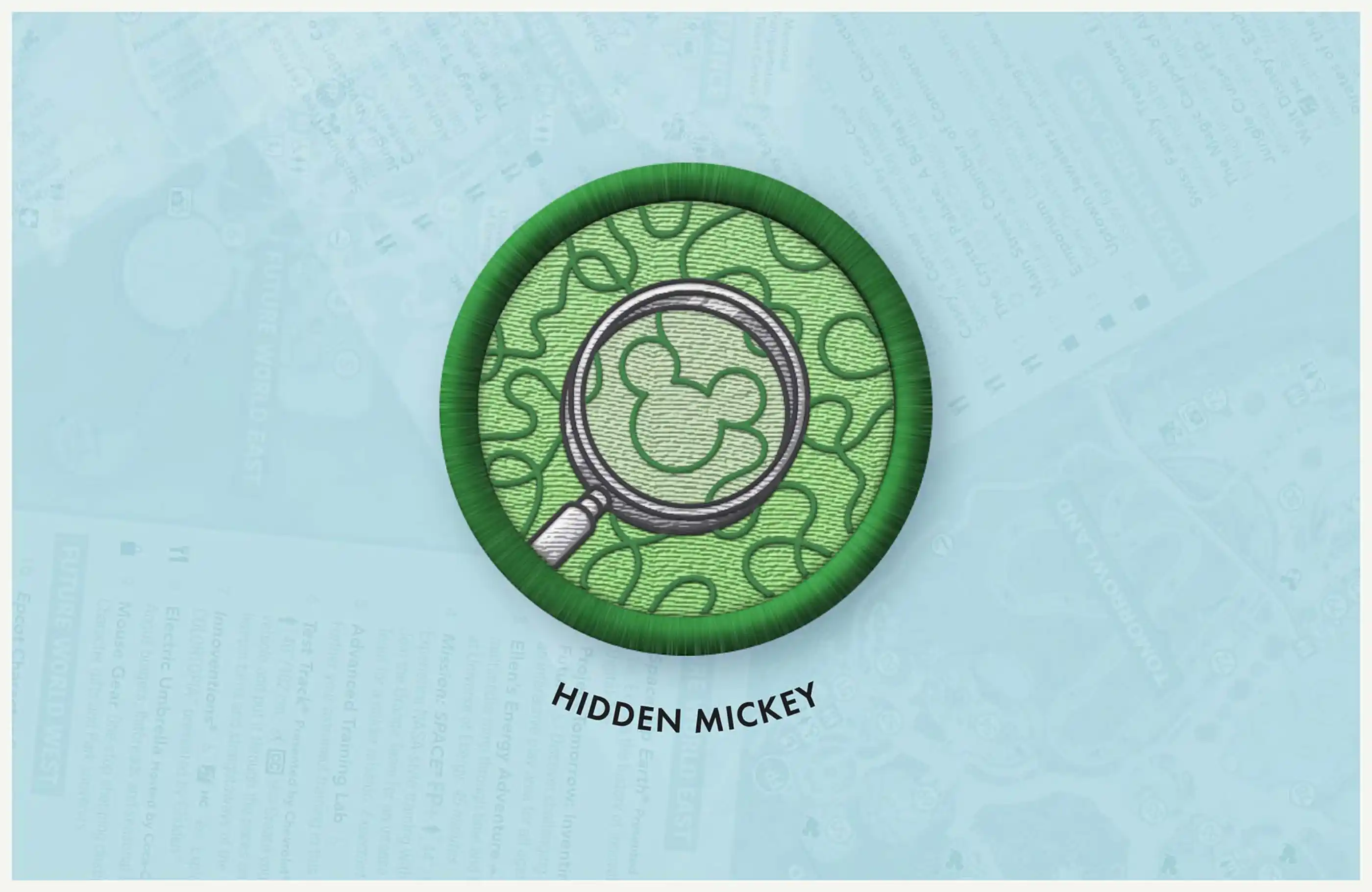 Close-up of Hidden Mickey badge.