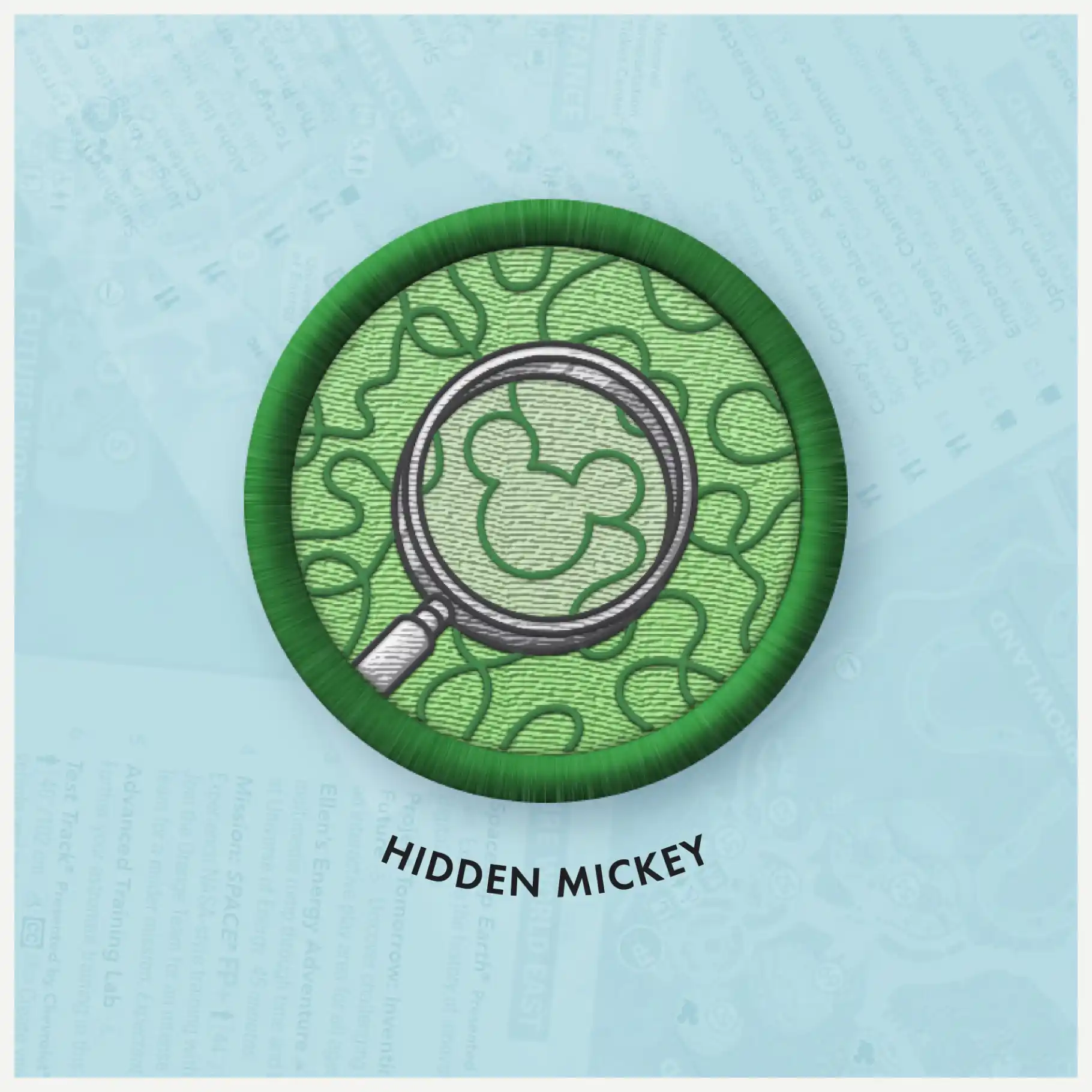 Close-up of Hidden Mickey badge.