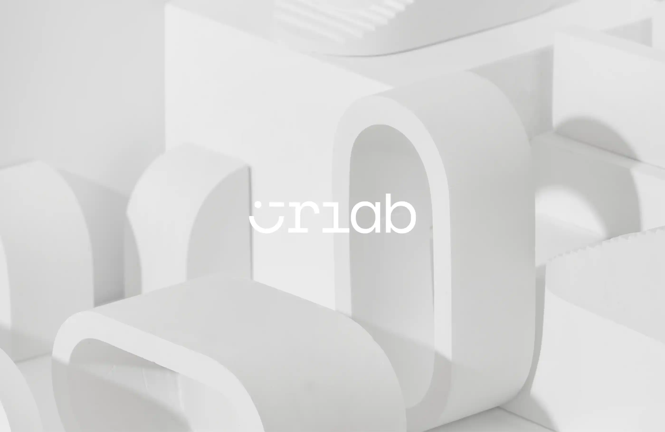 Urlab wordmark against photo of various abstract objects.